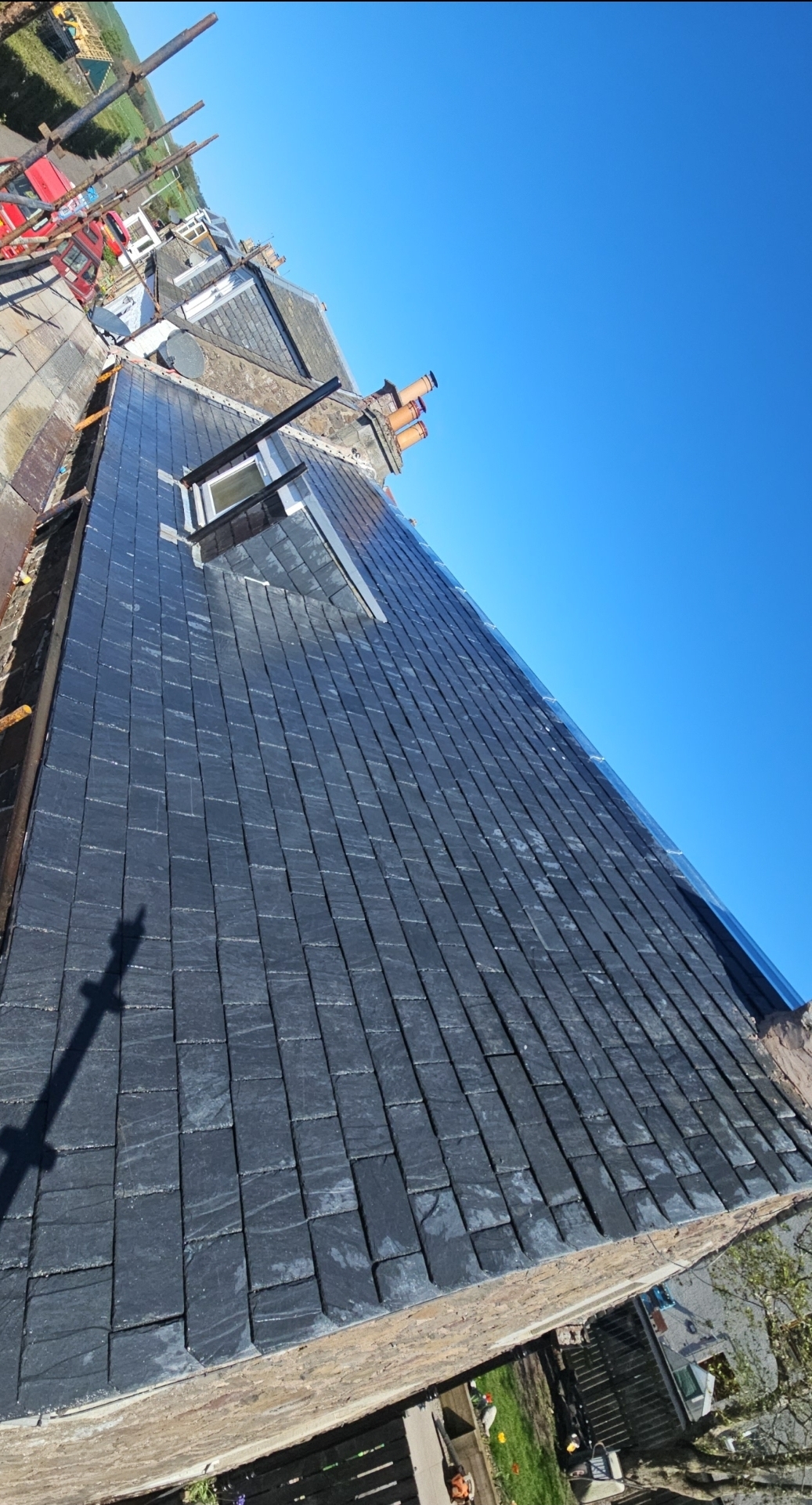 Slate roof with Velux window installation